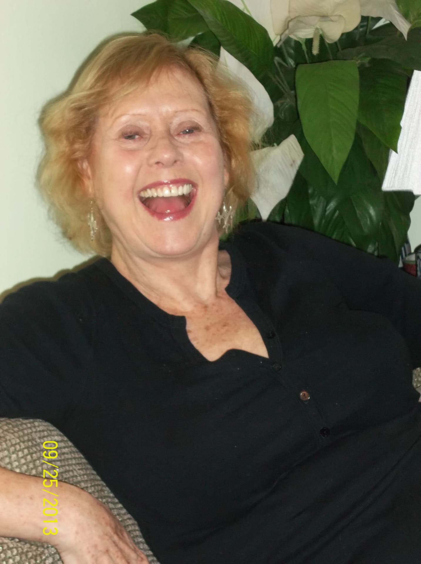 Paula Roberts laughing at home